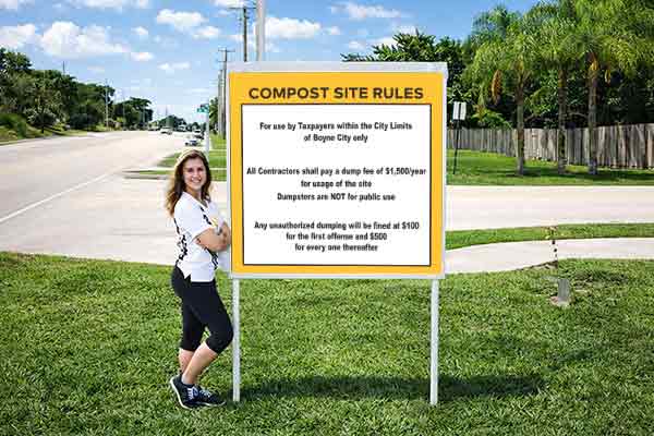 4x4 auction sign with metal post kit installed outdoors