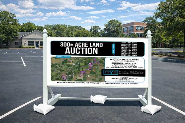 4x8 auctioneer sign mounted outdoors