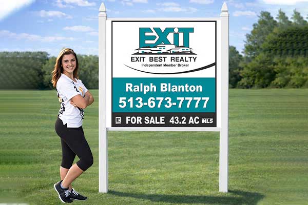 4x4 EXIT Realty sign mounted with PVC post kit