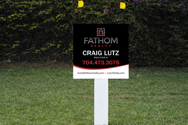 2x2 Fathom Realty signs for parcel marking