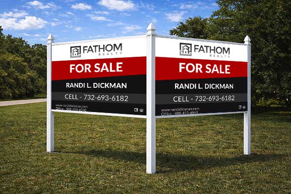 4x8 Fathom Realty sign installed outdoors