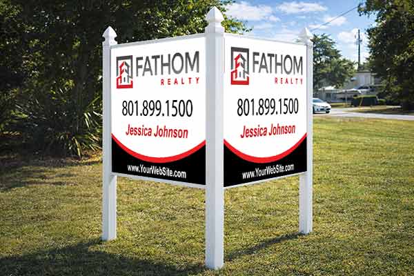 4x4 Fathom Realty sign mounted with PVC post kit