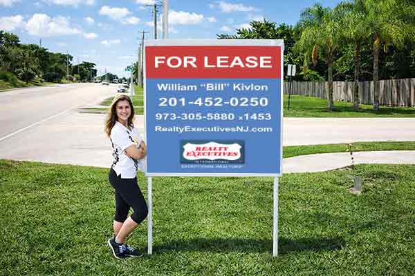 4x4 Realty Executives sign with metal post kit installed