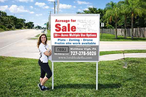 4x4 Real Broker sign with metal post kit installed