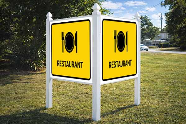 4x4 auction sign with arrow post kit installed outdoors