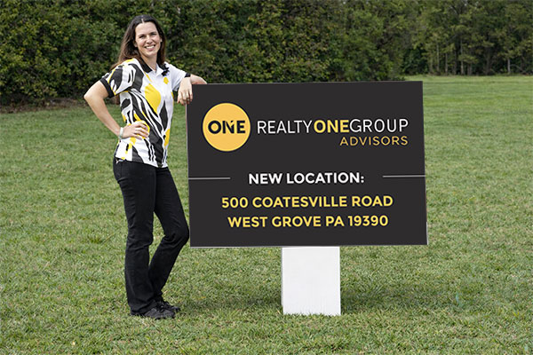 32x48 Realty ONE Group real estate sign for neighborhood direction